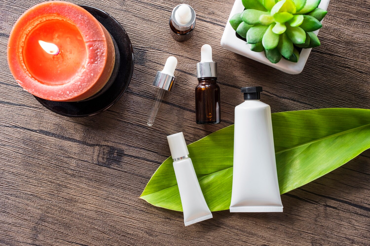 overhead view spa cosmetic product essential oil wooden table 23 2147883742